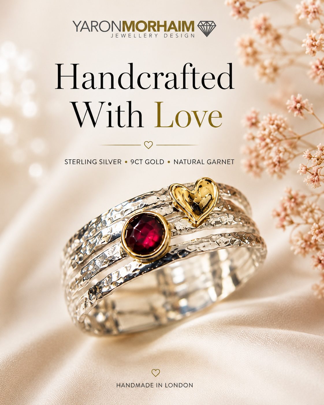 Handcrafted sterling silver ring with 9ct gold heart detail and natural garnet gemstone by Yaron Morhaim