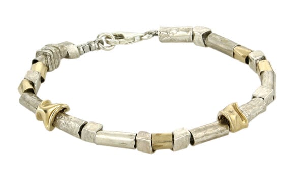 A stunning combination of components made from 925 sterling silver and 14k rolled gold make this bracelet unique and funky. Approx length 20cm