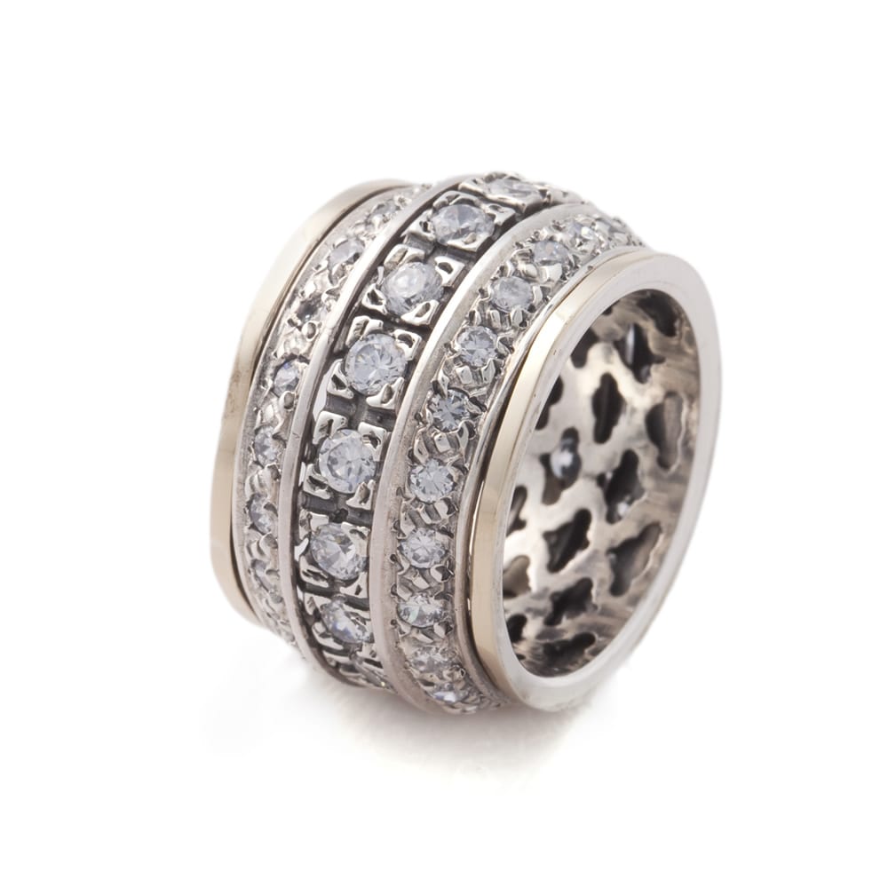 silver gold cz spinning ring on hand