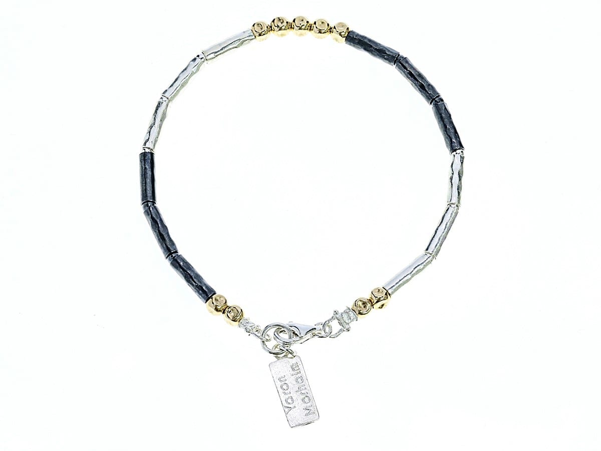 Luxury oxidised silver bracelet with gold tube accents