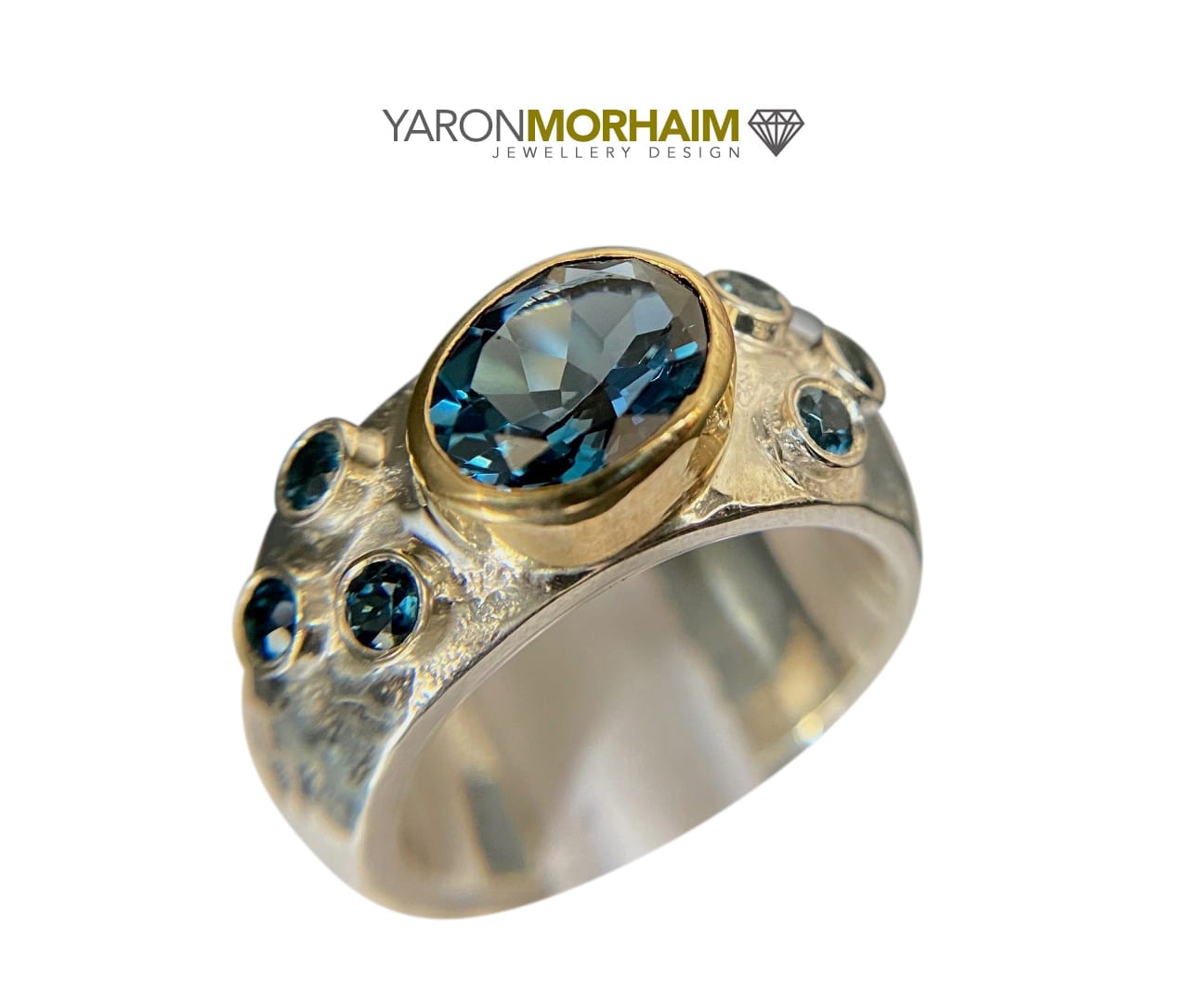 London blue topaz ring angled view showing textured band