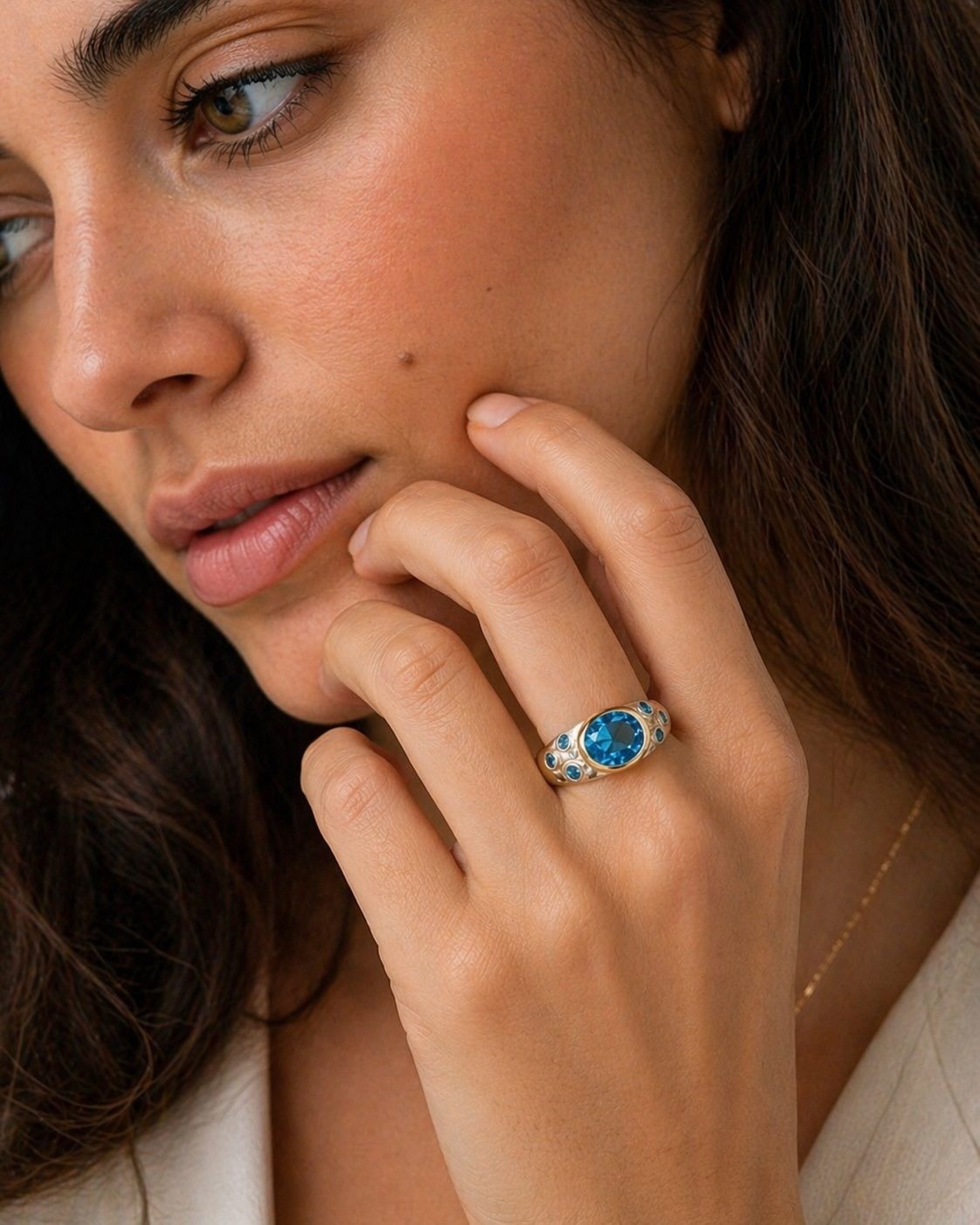 Swiss blue topaz ring in sterling silver with gold setting by Yaron Morhaim