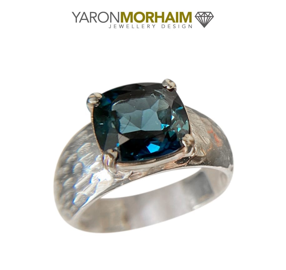 close up london blue topaz square cut gemstone detail