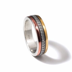 Silver spinning ring with rose gold, yellow gold, and cubic zirconia rotating bands