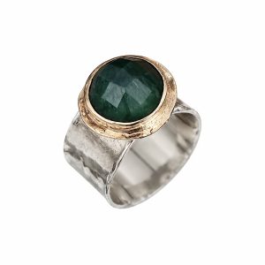 Emerald silver gold ring with faceted green gemstone and mixed metal setting