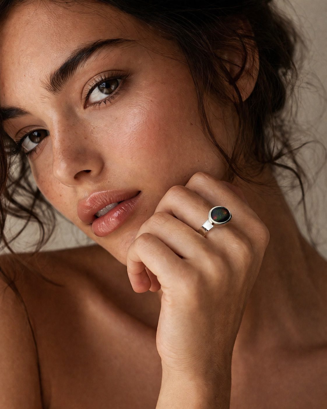 Model wearing Yaron Morhaim silver and gold black opal statement ring