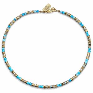 Handcrafted turquoise bead necklace with sterling silver and gold accents